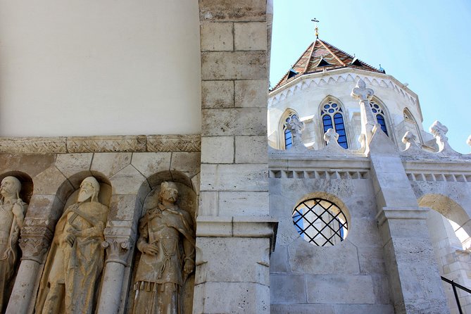 Buda Castle District Walk with Entry to Matthias Church - Buda Castle courtyards and royal symbols