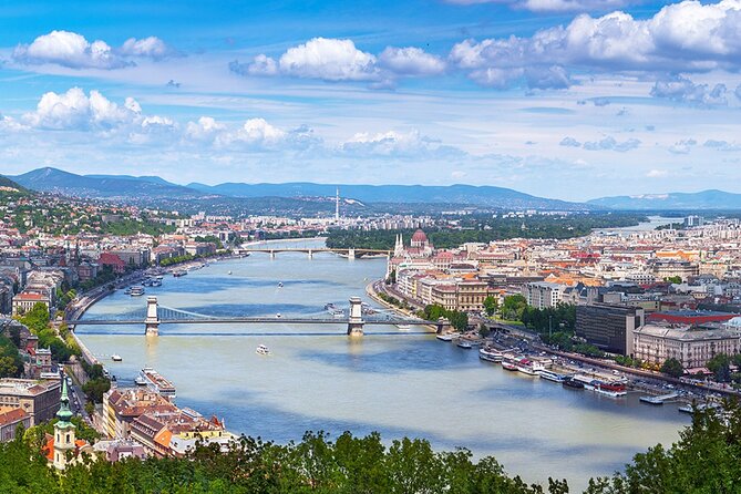 Budapest Audio Guide Cruise with Day, Sunset and Night Options - The university, Petőfi Bridge, and the National Theatre