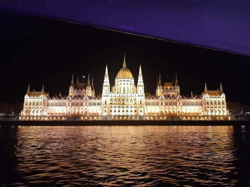 Budapest: Boat Cruise with Personal Guide and Drink - A public boat with a small guided group