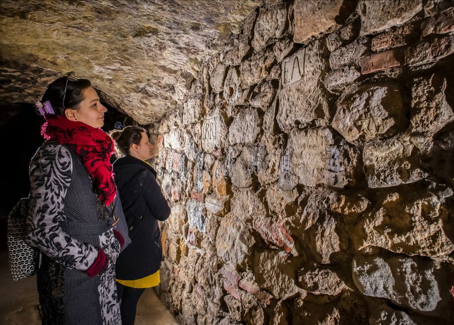 Budapest: Buda Castle Cave Tour - Medieval Prison, Wartime Shelter, and Other Uses