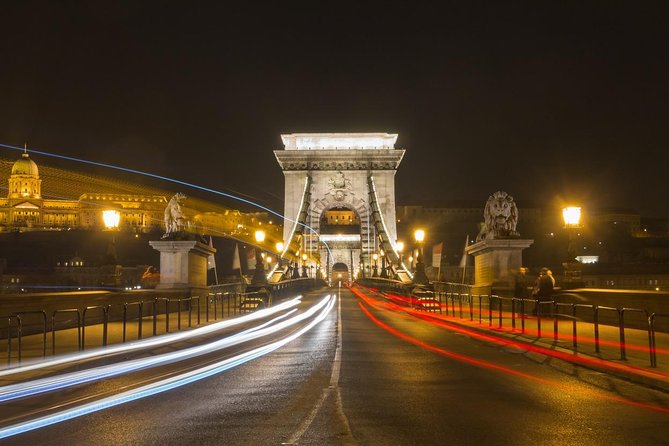 Budapest by night - private driving tour - Parliament beside the dark Danube