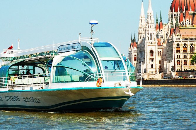 Budapest Parliament Audio Guide Tour with Danube Cruise - Boarding the Danube cruise at night