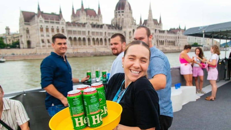 Budapest: Sip & Sail Danube Cruise with Unlimited Beer - A sunset view of Budapest with a beer in hand