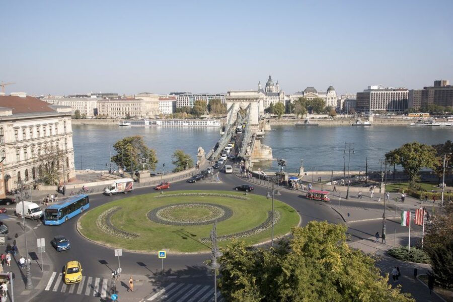 Castle District & Pest Driving Tour with Danube River Cruise - Seeing Pest from the road