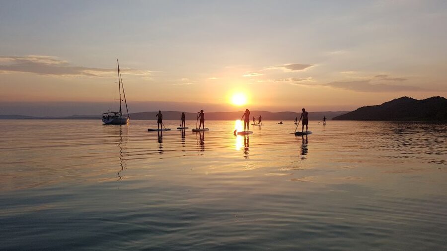 Lake Balaton: Sunset SUP Tour along the Tihany National Park - Getting set with a board, paddle, and safety gear